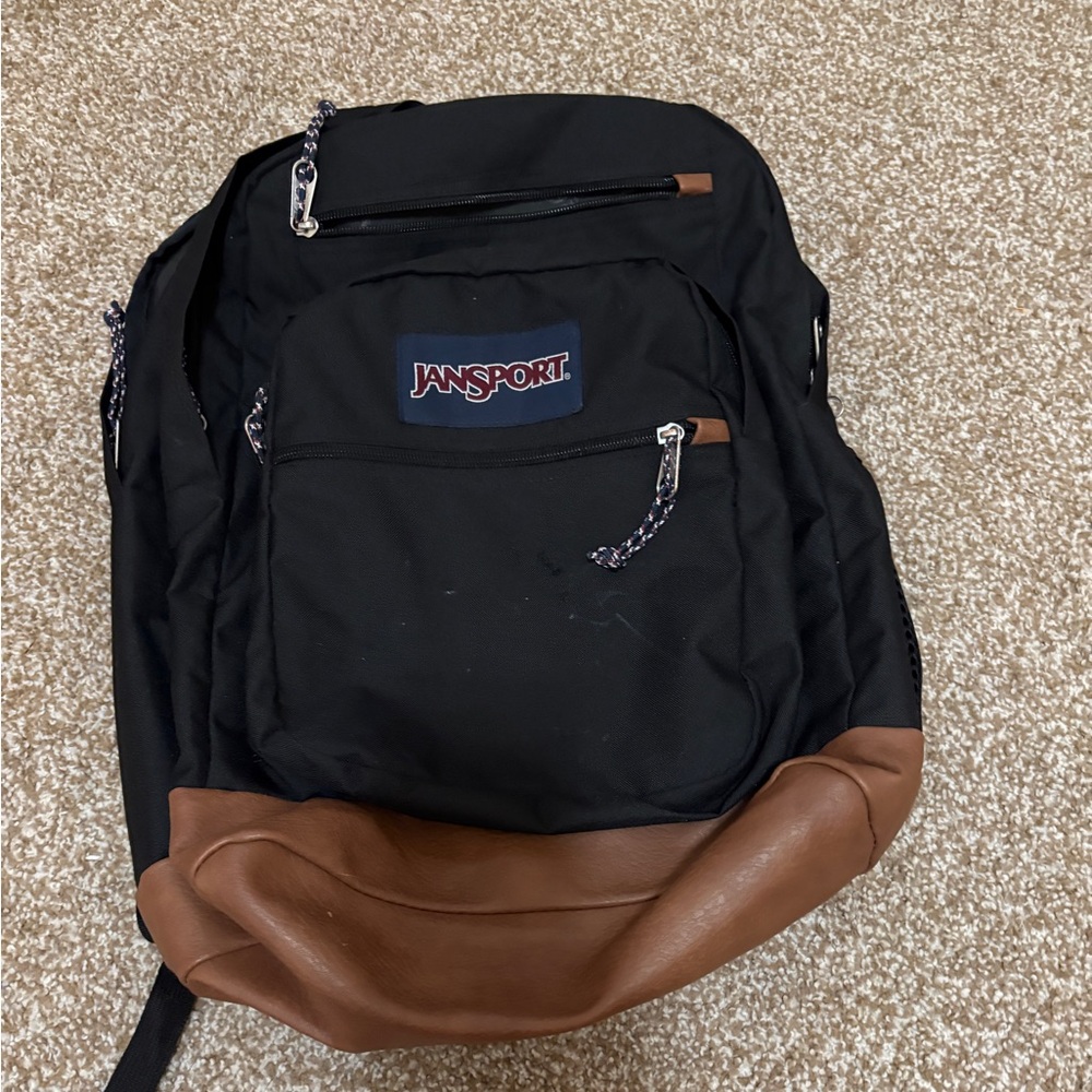 JanSport Black Backpack with Brown Base